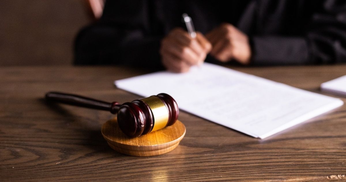 Wooden gavel on a wood table