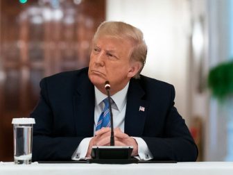 President Donald J. Trump listens to participants deliver remarks during the National Dialog on Safely Reopening America's Schools event Tuesday, July 7, 2020, in the East Room of the White House. (Official White House Photo by Andrea Hanks)