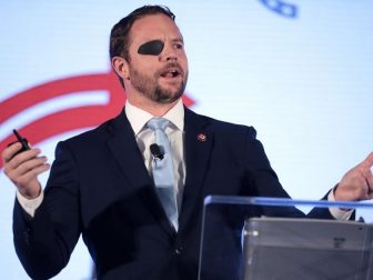 U.S. Congressman Dan Crenshaw speaking with attendees at the 2019 Teen Student Action Summit hosted by Turning Point USA at the Marriott Marquis in Washington, D.C.