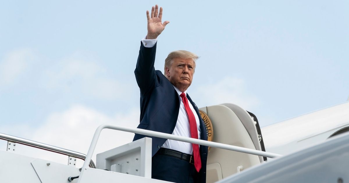 President Donald J. Trump waves Tuesday, Sept. 8, 2020, at Joint Base Andrews, Md., as he boards Air Force One to begin his trip to Florida. (Official White House Photo by Joyce N. Boghosian)