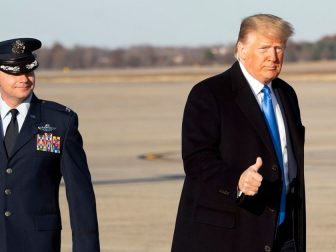 Former President Donald Trump gives a thumbs up prior to boarding Air Force One at Joint Base Andrews, Maryland, on Dec. 7, 2019.