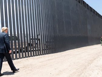 President Donald J. Trump walks along the completed 200th mile of new border wall Tuesday, June 23, 2020, along the U.S.-Mexico border near Yuma, Ariz. (Official White House Photo by Shealah Craighead)