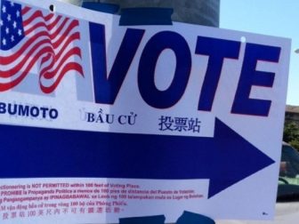 A vote sign is seen above.