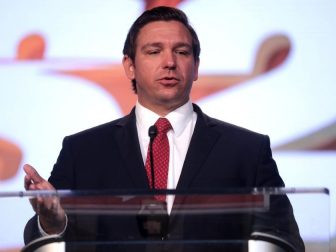 Governor-elect Ron DeSantis speaking with attendees at the 2018 Student Action Summit hosted by Turning Point USA at the Palm Beach County Convention Center in West Palm Beach, Florida.