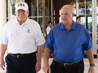 Former President Donald Trump and former radio commentator Rush Limbaugh walk together on April 19, 2019, following their round of golf at the Trump International Golf Club in West Palm Beach, Florida.