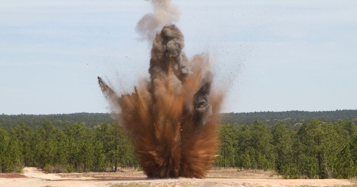 A 40-pound crater charge is set off by Florida National Guardsmen to create a crater obstacle April 10 at McCrady Training Center. Soldiers learned numerous new techniques during a two-week Combat Engineer Course, reclassifying as 12B at McCrady Training Center. The classes encompassed breaching doors, creating craters and other obstacles and recognizing Improvised Explosive Devices (IEDs) and other traps. (Photo by Sgt. Brad Mincey, 108th Public Affairs Detachment/Released)