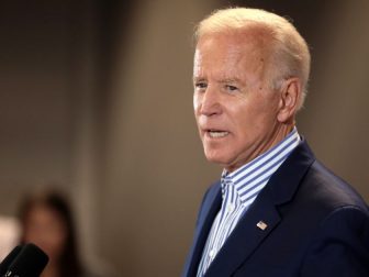 Former Vice President of the United States Joe Biden speaking with supporters at a town hall hosted by the Iowa Asian and Latino Coalition at Plumbers and Steamfitters Local 33 in Des Moines, Iowa.