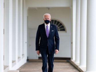 President Joe Biden walks along the Colonnade Thursday, Jan. 21, 2021, to the Oval Office of the White House. (Official White House Photo by Adam Schultz)
