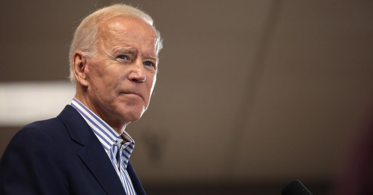 Former Vice President of the United States Joe Biden speaking with supporters at a town hall hosted by the Iowa Asian and Latino Coalition at Plumbers and Steamfitters Local 33 in Des Moines, Iowa.