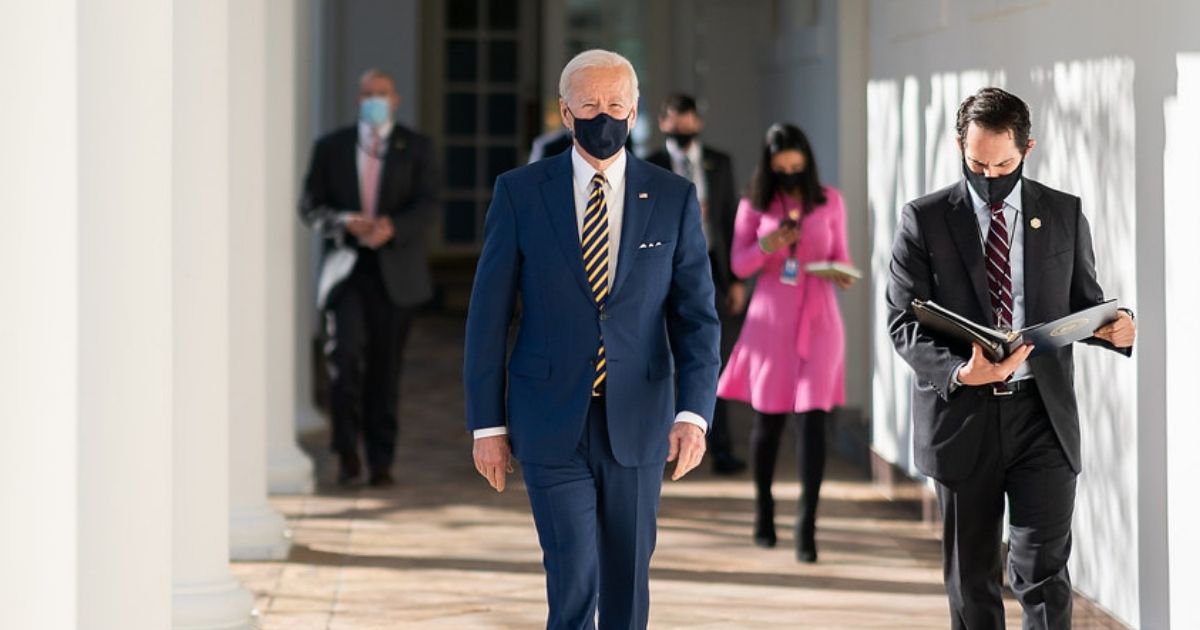 President Joe Biden walks with his personal aide Stephen Goepfert along the Colonnade Friday, Jan. 22, 2021, to a briefing on the economy in the State Dining Room of the White House. (Official White House Photo by Adam Schultz)