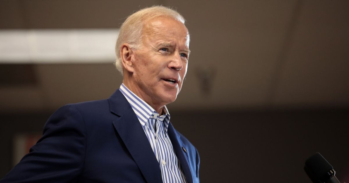 Former Vice President of the United States Joe Biden speaking with supporters at a town hall hosted by the Iowa Asian and Latino Coalition at Plumbers and Steamfitters Local 33 in Des Moines, Iowa.