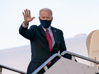 President Joe Biden waves as he boards Air Force One at Joint Base Andrews, Maryland Friday, Feb. 5, 2021, en route to New Castle County Airport in New Castle, Delaware. (Official White House Photo by Carlos Fyfe)