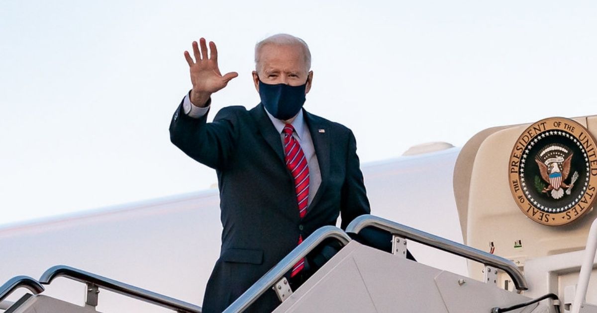 President Joe Biden waves as he boards Air Force One at Joint Base Andrews, Maryland Friday, Feb. 5, 2021, en route to New Castle County Airport in New Castle, Delaware. (Official White House Photo by Carlos Fyfe)