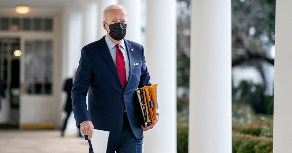 President Joe Biden walks along the Colonnade of the White House Thursday, Jan. 28, 2021, en route to the Oval Office. (Official White House Photo by Adam Schultz)