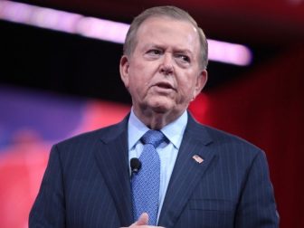 Lou Dobbs speaking at the 2015 Conservative Political Action Conference (CPAC) in National Harbor, Maryland.