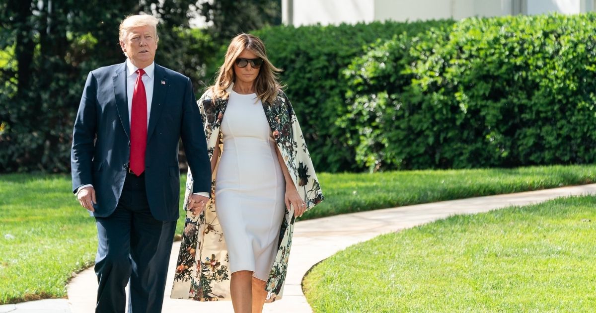 President Donald J. Trump and First Lady Melania Trump walk from the Oval Office to board Marine One Thursday, April 18, 2019, at the White House. (Official White House Photo by Andrea Hanks)