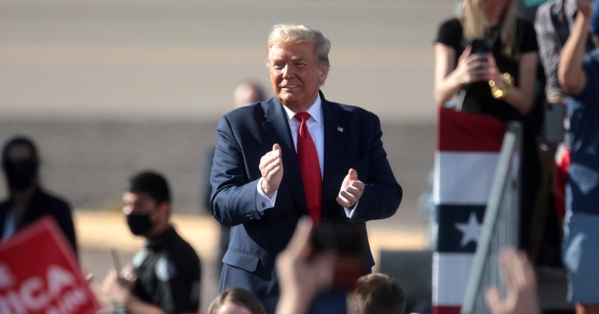 President of the United States Donald Trump speaking with supporters at a "Make America Great Again" campaign rally at Phoenix Goodyear Airport in Goodyear, Arizona.