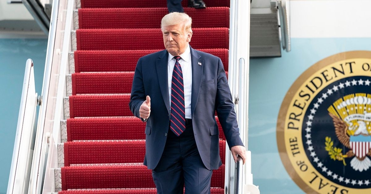 President Donald J. Trump waves and gives a thumbs-up as he disembarks Air Force One Tuesday, Sept. 15, 2020, at Philadelphia International Airport in Philadelphia. (Official White House Photo by Joyce N. Boghosian)