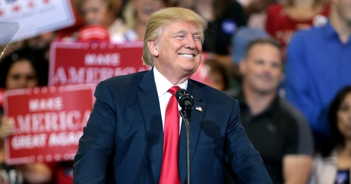 Donald Trump speaking with supporters at a campaign rally at the Phoenix Convention Center in Phoenix, Arizona.