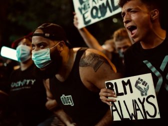 BLM protesters holding signs