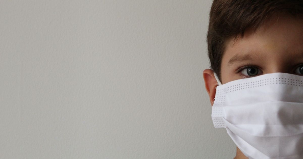 Boy in covid mask