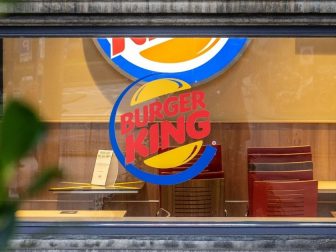 A Burger King located in an old building.
