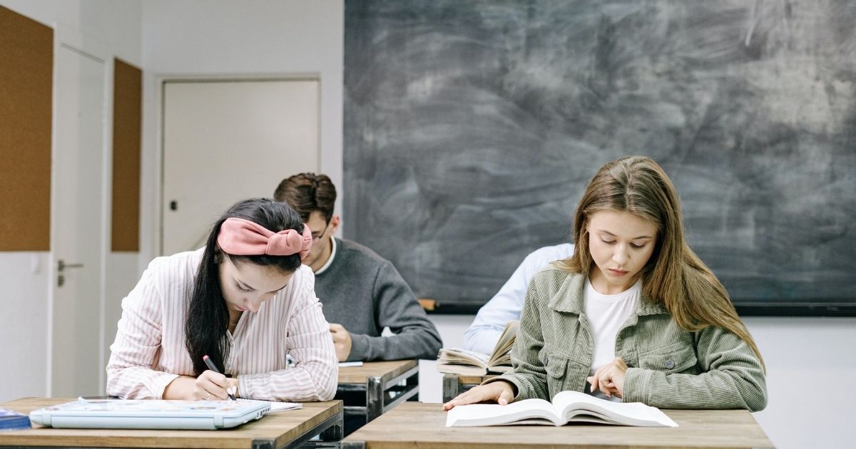 High schoolers studying in a classroom