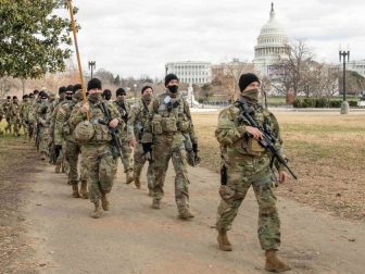 U.S. Army Soldiers assigned to the Virginia Army National Guard’s 1st Battalion, 116th Infantry Regiment, 116th Infantry Brigade Combat Team march to their posts near the U.S Capitol building Jan. 17, 2021, in Washington, D.C. At least 25,000 National Guard men and women have been authorized to conduct security, communication and logistical missions in support of federal and District authorities leading up and through the 59th Presidential Inauguration. (U.S. Air National Guard photo by Tech. Sgt. Lucretia Cunningham)