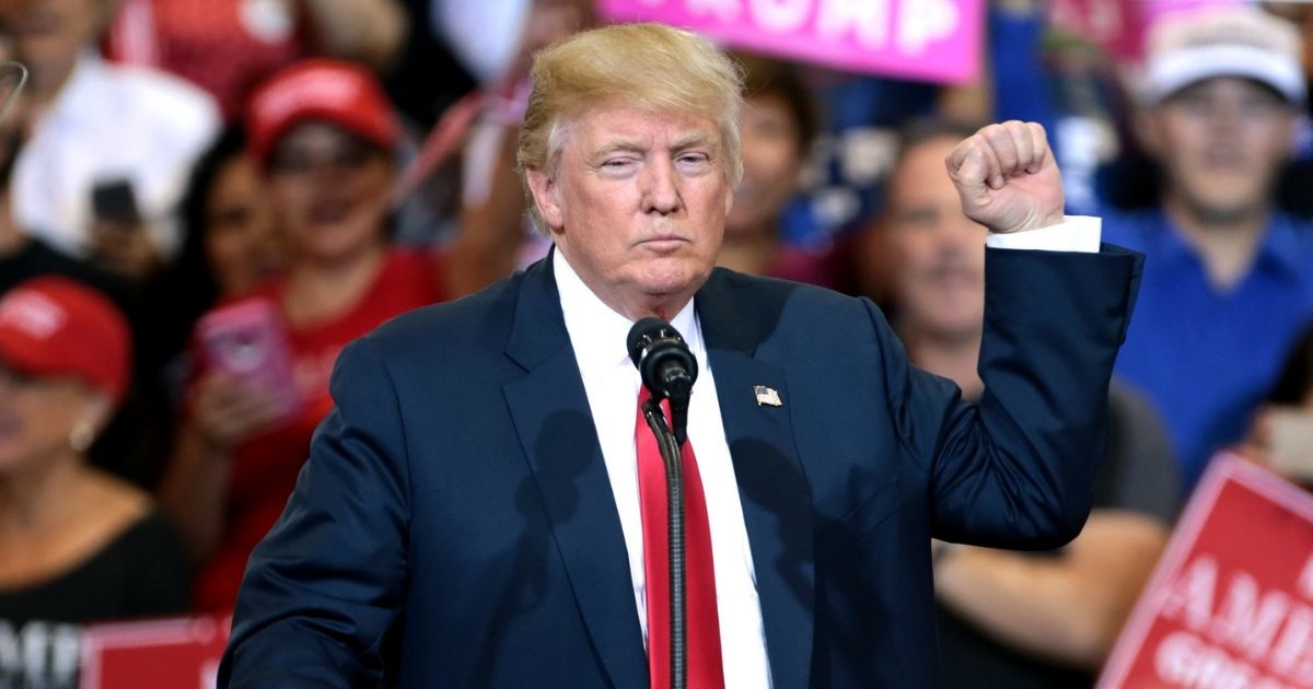 Donald Trump speaking with supporters at a campaign rally at the Phoenix Convention Center in Phoenix, Arizona.