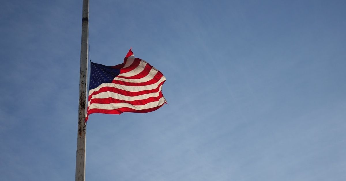 US flag flying half-staff