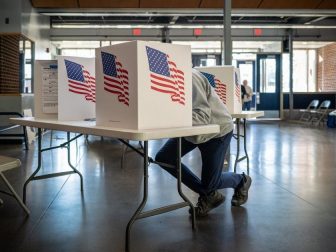 Voters in Des Moines precincts 43, 61 and 62 cast their ballots at Roosevelt High School.