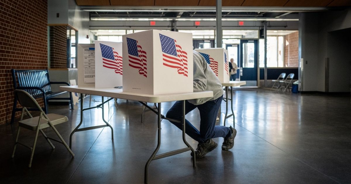 Voters in Des Moines precincts 43, 61 and 62 cast their ballots at Roosevelt High School.