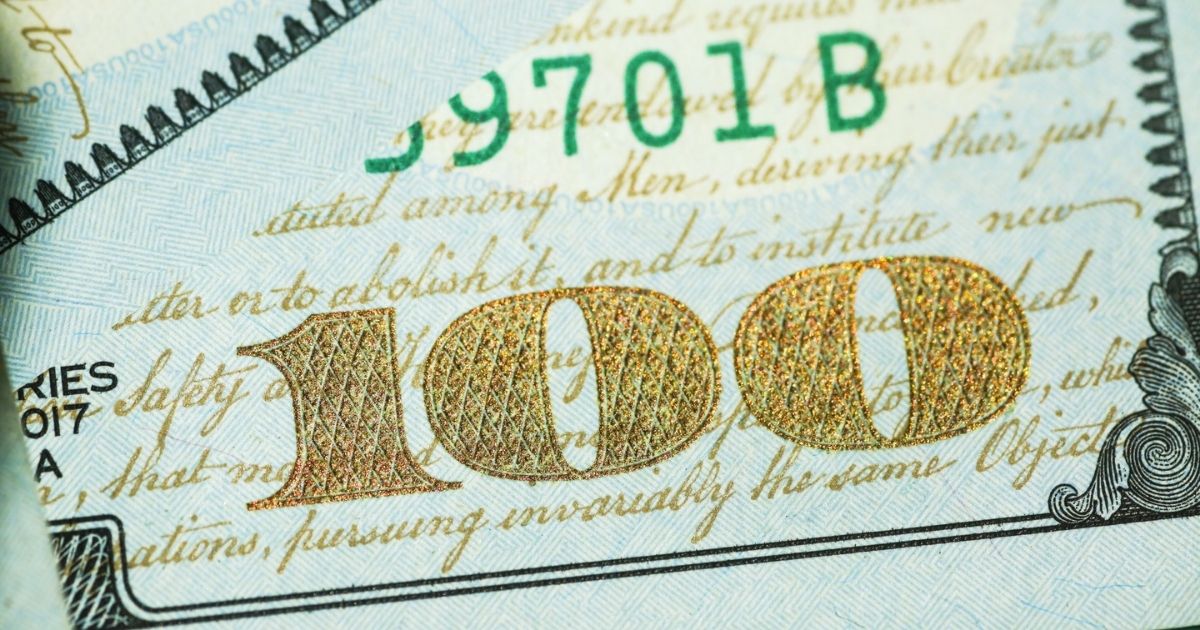 Corner of a US 100 dollar bill