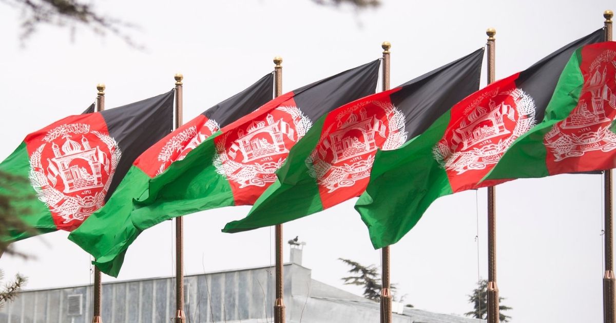 The Afghan Flag waves above the presidential palace during a meeting between Marine Corps Gen. Joe Dunford, chairman of the Joint Chiefs of Staff, Afghan President Ashraf Ghani, Chief Executive Abdullah Abdullah, and various other Afghan senior government and military leaders in Kabul, March 20, 2018. The senior leaders discussed the current security environment in Afghanistan, the progress of the Afghan National Defense and Security Forces, and the re-posturing of U.S. forces as part of the new South Asia strategy. (DoD Photo by Navy Petty Officer 1st Class Dominique A. Pineiro)