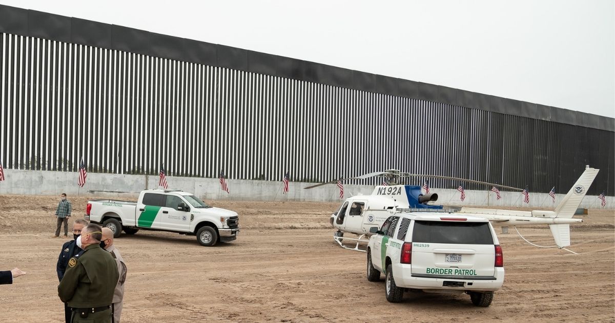 President Donald J. Trump, joined by U.S. Border Patrol officials, visits a border wall site Tuesday, Jan. 12, 2021, at the Texas-Mexico border near Alamo, Texas (Official White House Photo by Shealah Craighead)