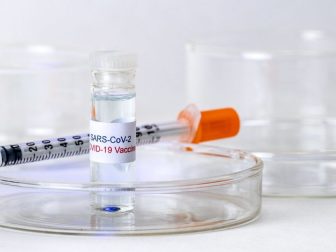 COVID-19 Vaccine with Syringe