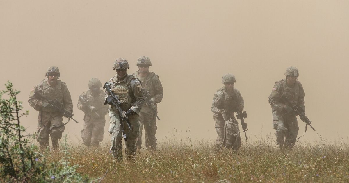Cavalry scouts with the 1st Battalion, 16th Infantry Regiment, 1st Armored Brigade Combat Team, 1st Infantry Division maneuver toward cover after an air assault during Platinum Lion 19 at Novo Selo Training Area, July 9, 2019. Exercise Platinum Lion is a battalion level Peace Keeping Operations / Counter Insurgency event designed to provide quality, organized and realistic training for designated military units from NATO partners and allied countries. The exercise reinforces relationships in a joint training environment, builds understanding of partner nation tactics, techniques and procedures and increases interoperability within the military forces.