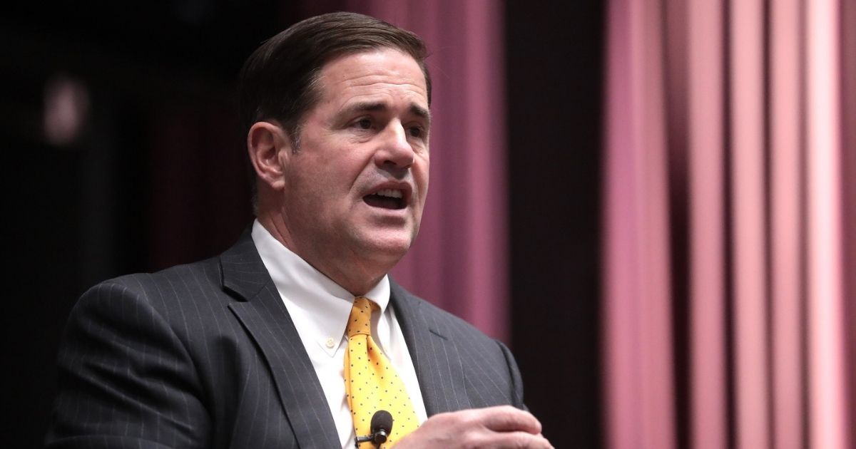 Governor Doug Ducey speaking with attendees at an event titled "The Future of Education in Arizona" hosted by ASU Political History and Leadership at Lattie F. Coor Hall at Arizona State University in Tempe, Arizona.