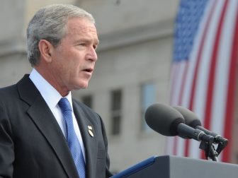 President George W. Bush speaks at the Pentagon Memorial dedication ceremony Sept. 11, 2008. The national memorial is the first to be dedicated to those killed at the Pentagon on Sept. 11, 2001. The site contains 184 inscribed memorial units honoring the 59 people aboard American Airlines Flight 77 and the 125 in the building who lost their lives that day. (DoD photo by Cherie Cullen/Released)