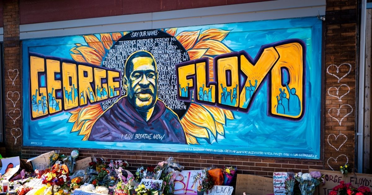 beautiful graffiti mural honoring george floyd from black lives matter protest