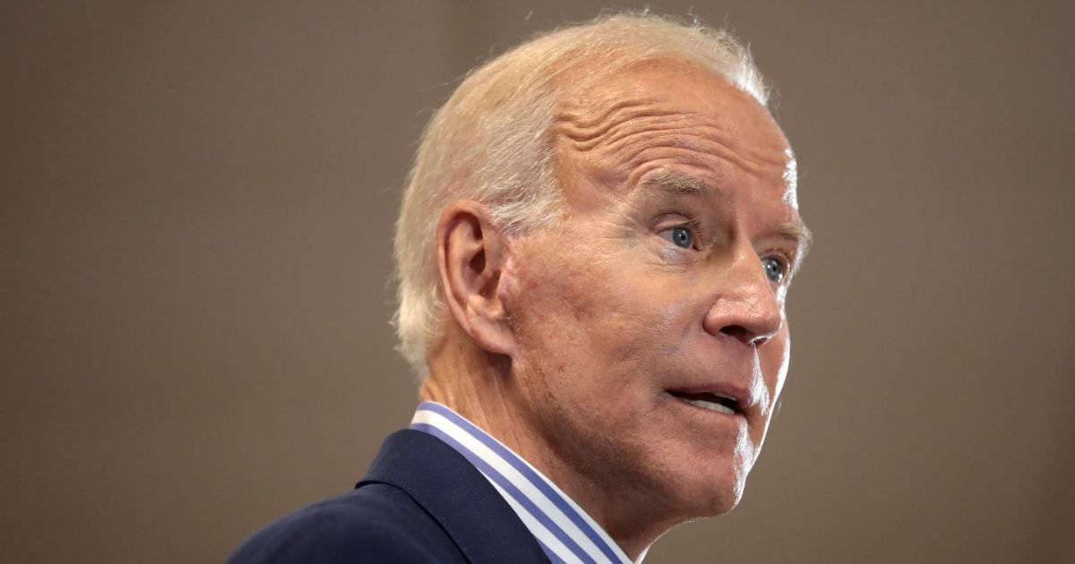 Former Vice President of the United States Joe Biden speaking with supporters at a town hall hosted by the Iowa Asian and Latino Coalition at Plumbers and Steamfitters Local 33 in Des Moines, Iowa.