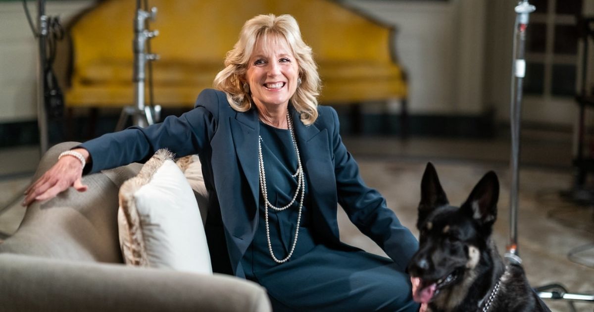 First Lady Dr. Jill Biden and the Biden family dog Major prepare to tape a video segment with President Joe Biden for Super Bowl LV Wednesday, Feb. 3, 2021, in the Diplomatic Reception Room of the White House. (Official White House Photo by Adam Schultz)