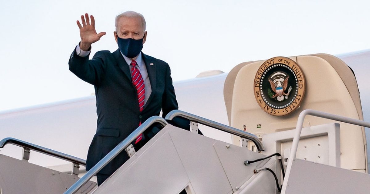 President Joe Biden waves as he boards Air Force One at Joint Base Andrews, Maryland Friday, Feb. 5, 2021, en route to New Castle County Airport in New Castle, Delaware. (Official White House Photo by Carlos Fyfe)