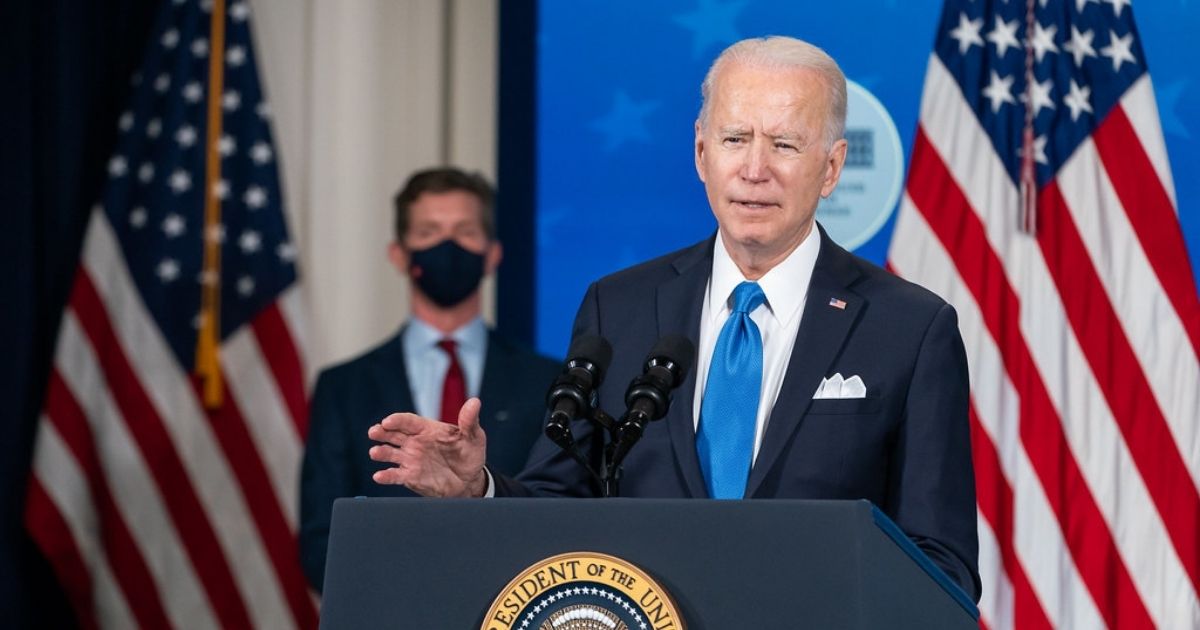 Johnson & Johnson CEO Alex Gorsky looks on as President Joe Biden delivers remarks on COVID-19 vaccine production Wednesday, March 10, 2021, in the South Court Auditorium in the Eisenhower Executive Office Building at the White House. (Official White House Photo by Adam Schultz)