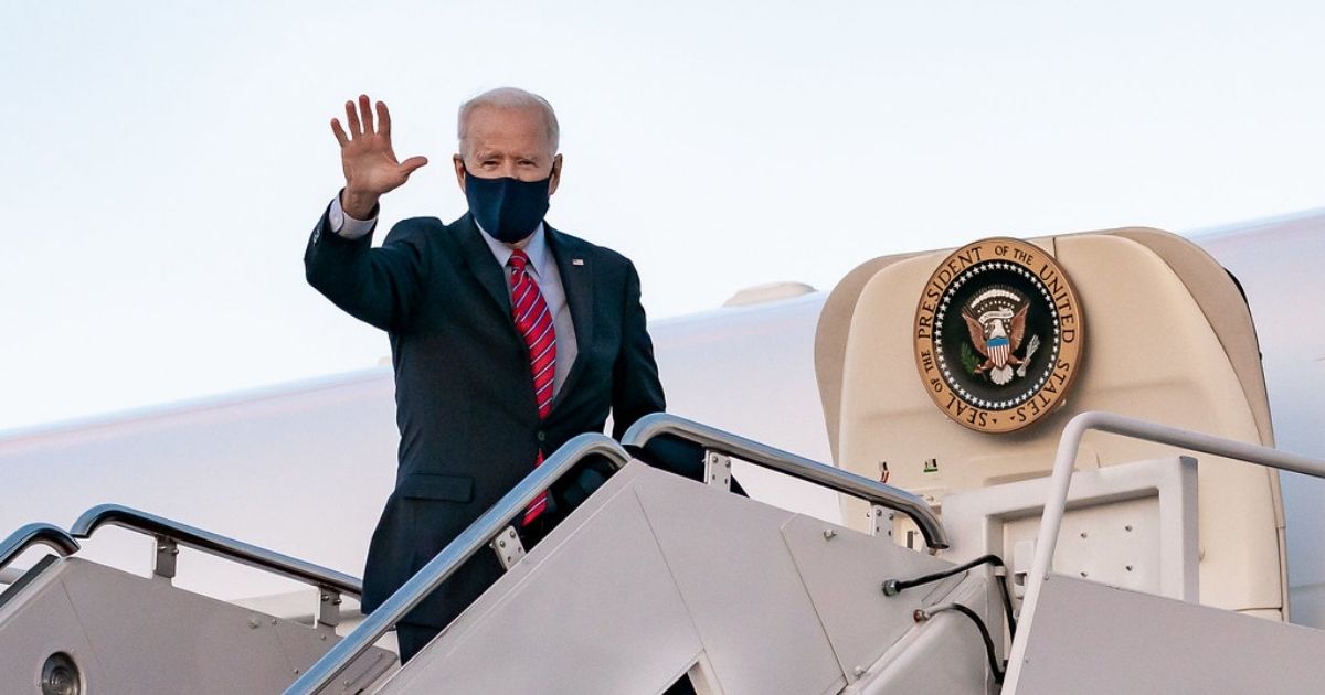 President Joe Biden waves as he boards Air Force One at Joint Base Andrews, Maryland Friday, Feb. 5, 2021, en route to New Castle County Airport in New Castle, Delaware. (Official White House Photo by Carlos Fyfe)