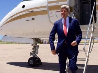 U.S. Secretary of State John Kerry, making the first visit of a Secretary of State to Somalia, deplanes as he arrives at Mogadishu Aden Abdulle International Airport in Mogadishu, Somalia, on May 6, 2015, for meetings with Somali President Hassan Sheikh Mohamud, Prime Minister Omar Abdirashid Ali Sharmarke, Somali regional leaders, members of Somali civil society, and U.S. Special Representative for Somalia James McAnulty. [State Department Photo/Public Domain]