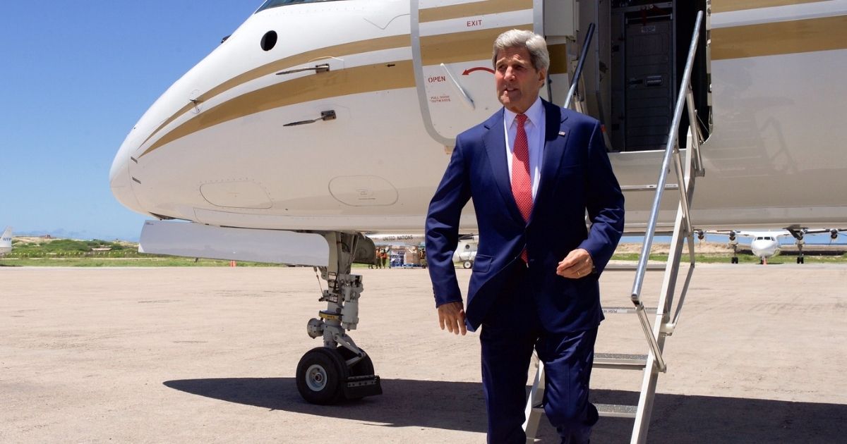 U.S. Secretary of State John Kerry, making the first visit of a Secretary of State to Somalia, deplanes as he arrives at Mogadishu Aden Abdulle International Airport in Mogadishu, Somalia, on May 6, 2015, for meetings with Somali President Hassan Sheikh Mohamud, Prime Minister Omar Abdirashid Ali Sharmarke, Somali regional leaders, members of Somali civil society, and U.S. Special Representative for Somalia James McAnulty. [State Department Photo/Public Domain]
