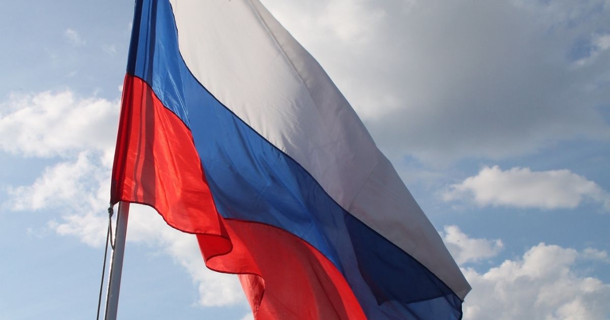 Russian flag flying on board boat on the Volga River