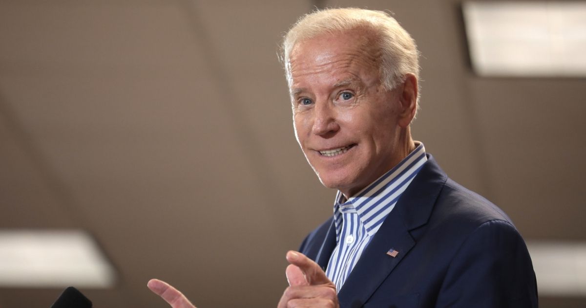 Former Vice President of the United States Joe Biden speaking with supporters at a town hall hosted by the Iowa Asian and Latino Coalition at Plumbers and Steamfitters Local 33 in Des Moines, Iowa.