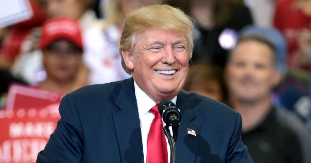 Donald Trump speaking with supporters at a campaign rally at the Phoenix Convention Center in Phoenix, Arizona.